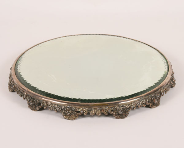 Appraisal: Victorian plateau mirror on floral silverplate base the mirror with