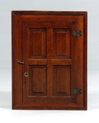 Appraisal: Kentucky Ohio cherry paneled cabinet hanging cabinet with single paneled