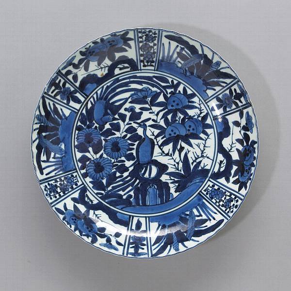 Appraisal: An Arita Kraak-style porcelain dish th Century Its shallow well