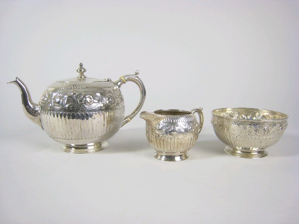 Appraisal: A Victorian three piece circular Tea Service semi-fluted and having