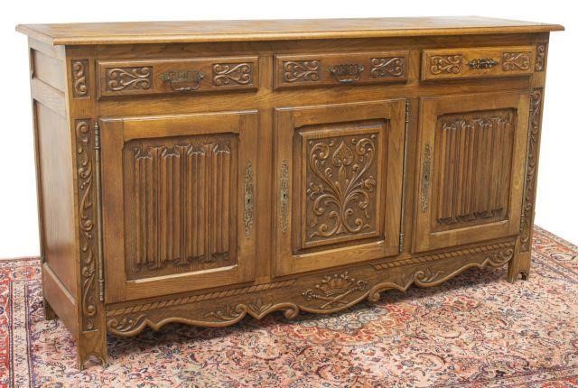 Appraisal: French Medieval style carved oak sideboard th c having rectangular