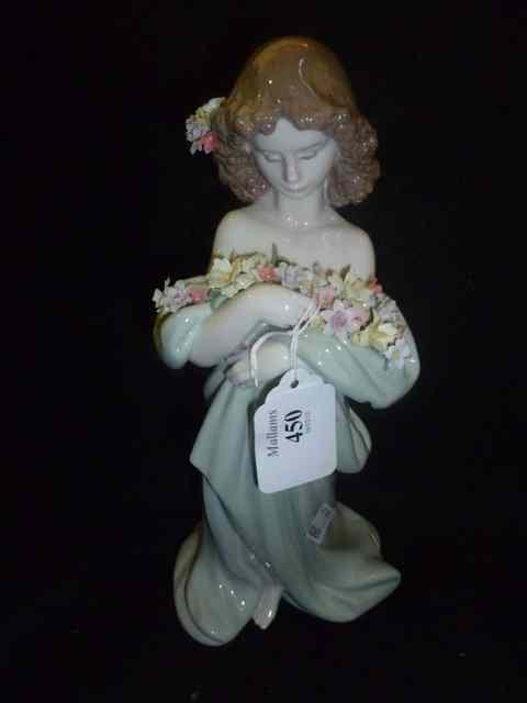 Appraisal: A LLADRO FIGURE OF A FLOWER GIRL in green flowing