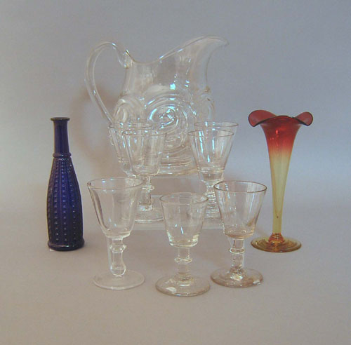 Appraisal: Seven blown glass cordials together with a pitcher vase and