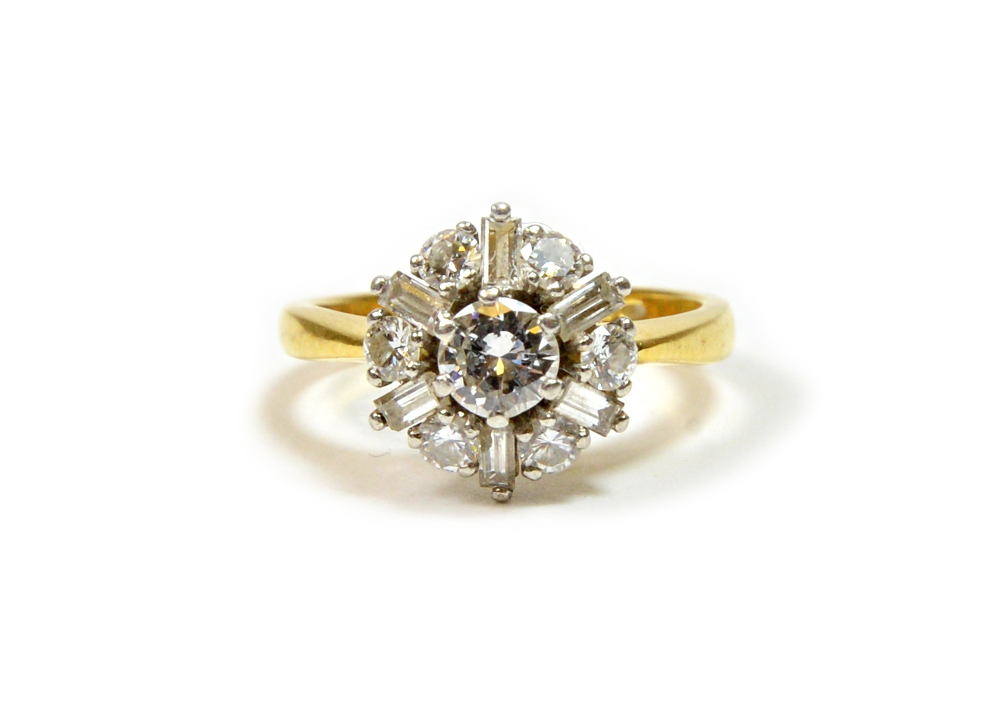 Appraisal: An ct gold diamond cluster ring the central brilliant-cut stone