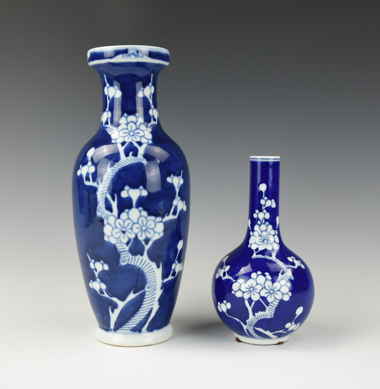 Appraisal: TWO CHINESE BLUE WHITE BOTTLE VASE TH C Decorated with