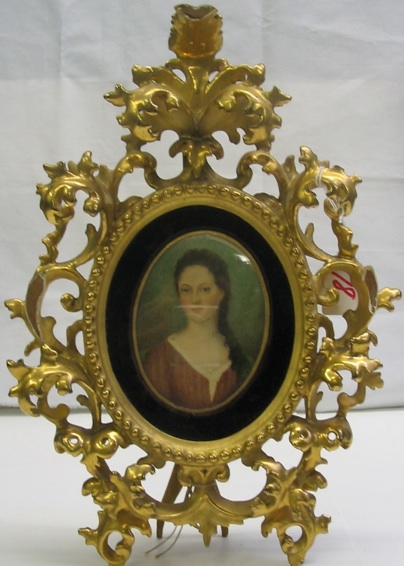 Appraisal: MINIATURE PORTRAIT OF WOMAN with long brown hair purportedly Miss