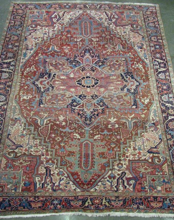 Appraisal: Antique Handmade Oriental Room Size Rug Heriz design red field