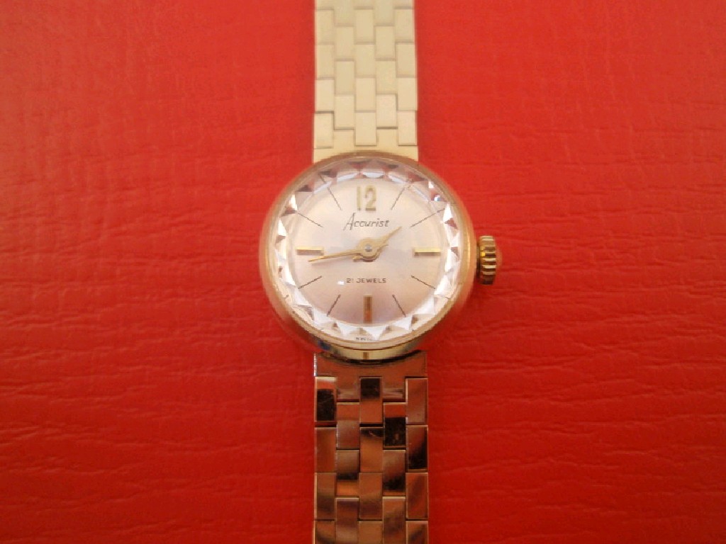 Appraisal: A ct gold cased Accurist ladies bracelet watch