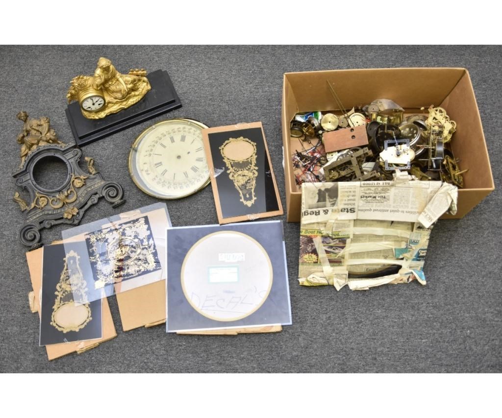 Appraisal: Large collection of clock parts including movements dials pendulums reverse