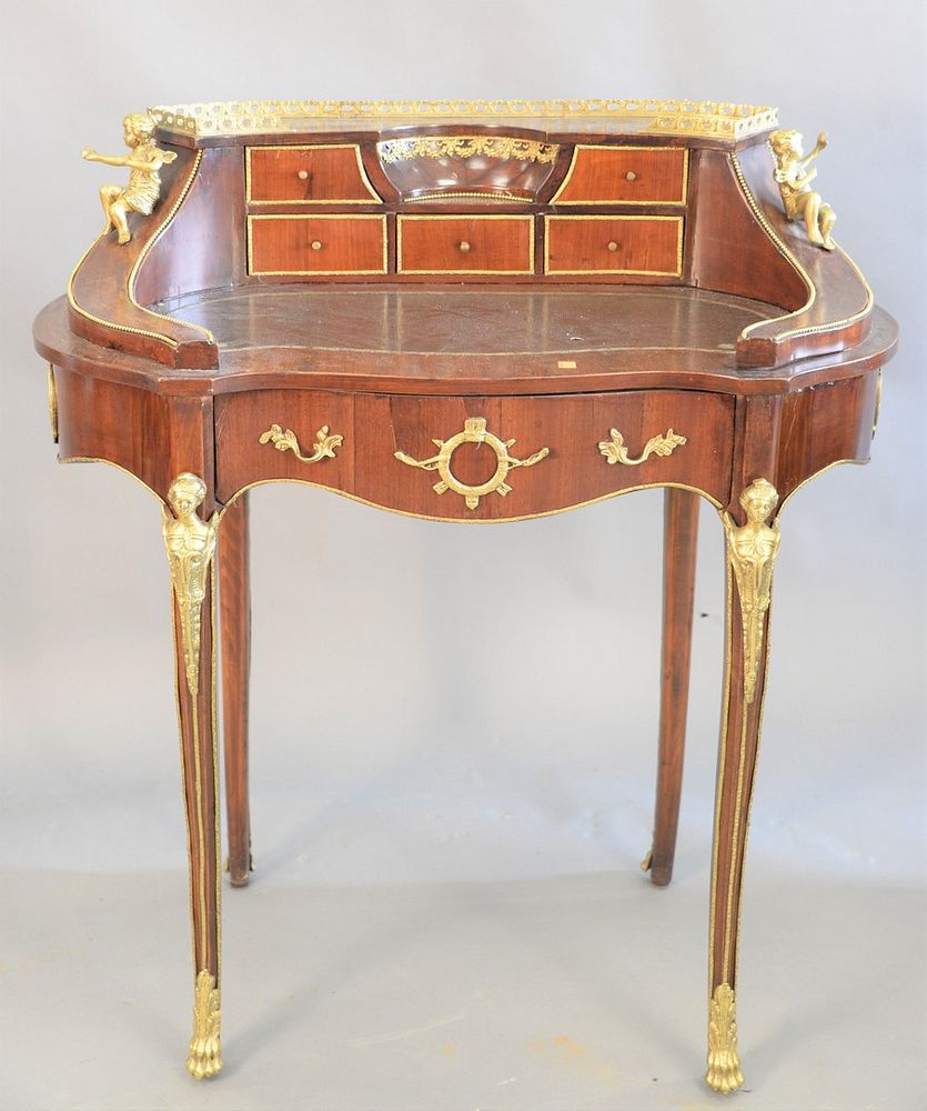 Appraisal: Small French oval desk leather top and brass figural mounts