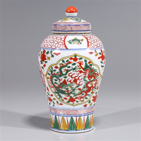 Appraisal: Chinese wucai covered porcelain vase with dragons chasing flaming pearl