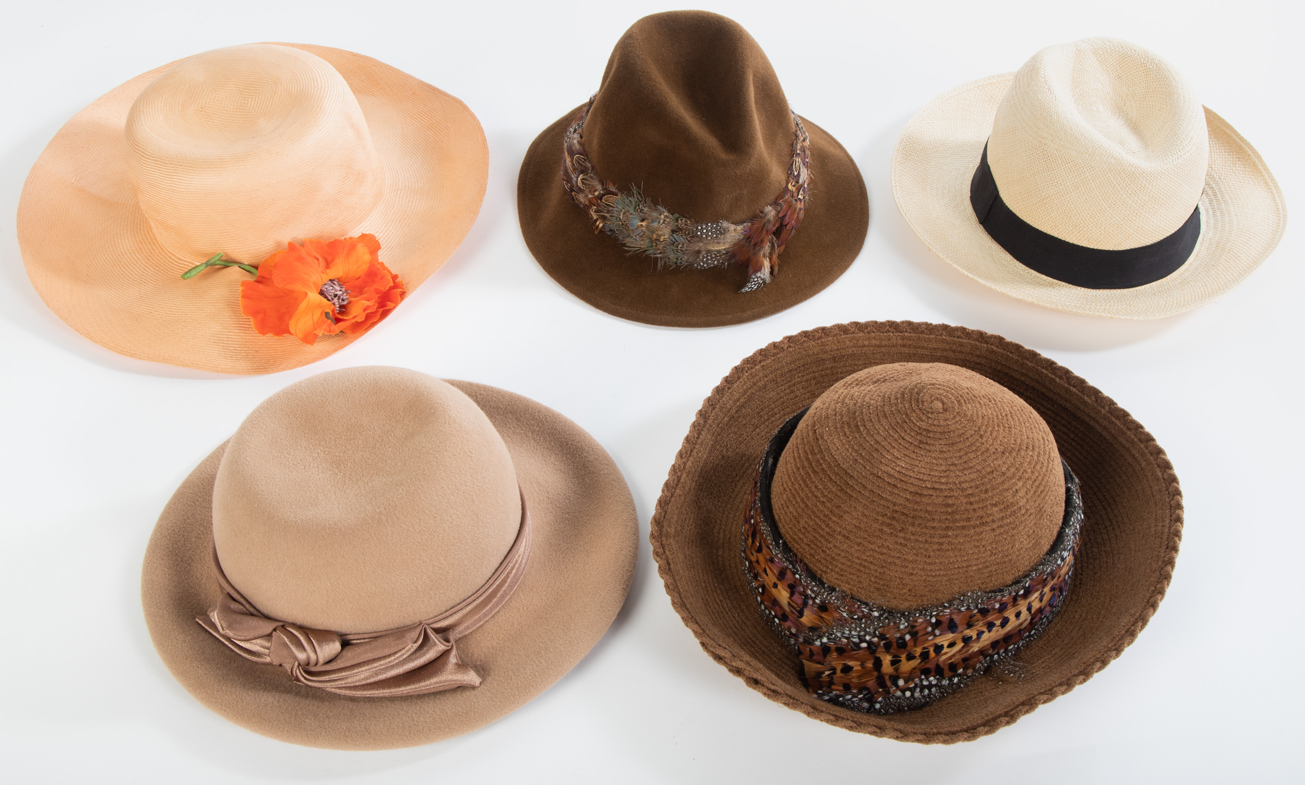 Appraisal: FIVE MISCELLANEOUS HATS one tan straw woven hat two brown