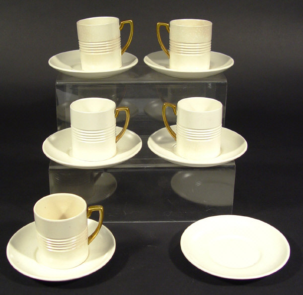 Appraisal: Five Wedgwood Keith Murray white glazed coffee cans and six