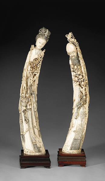 Appraisal: Two Chinese carved ivory immortals The first possibly depicting the