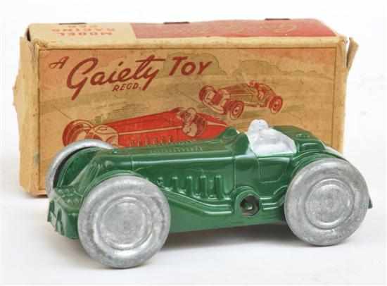 Appraisal: A GAIETY TOY CLOCKWORK MODEL RACING CAR RACING GREEN DRIVER