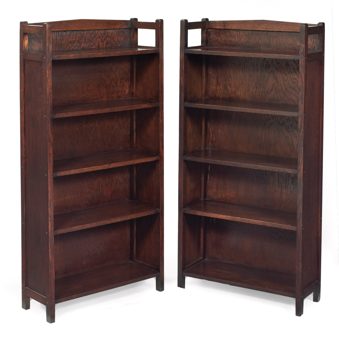 Appraisal: Arts Crafts bookcases pair peaked top above open shelves exposed