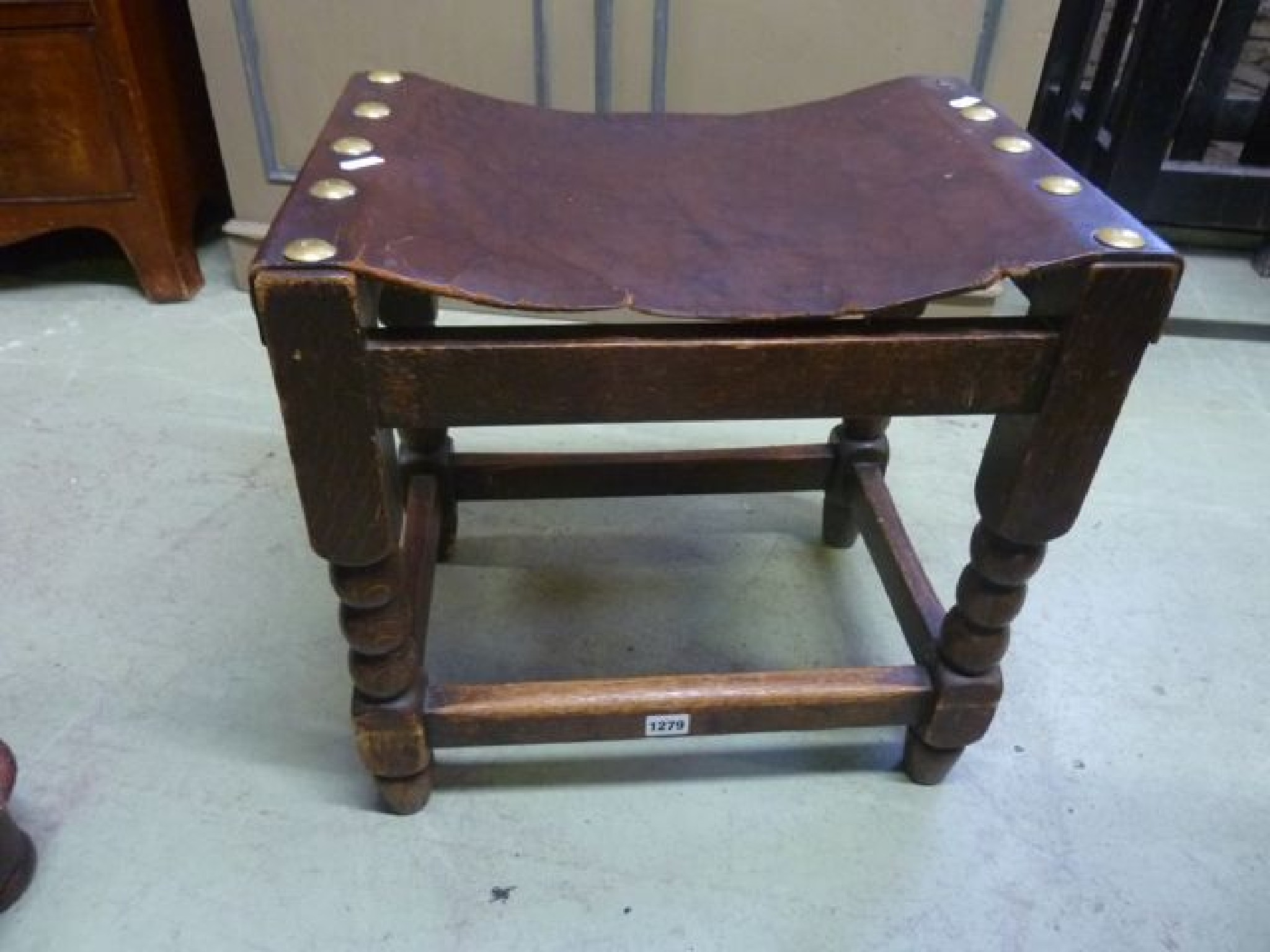 Appraisal: An Old English style oak occasional table of circular form