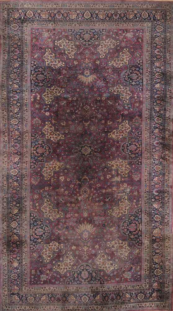 Appraisal: MESHED CARPET The central medallion and tan shaped crescents anchored