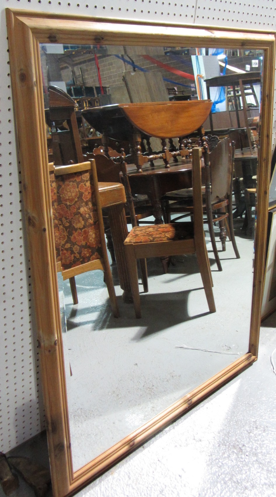 Appraisal: A large th century pine wall mirror