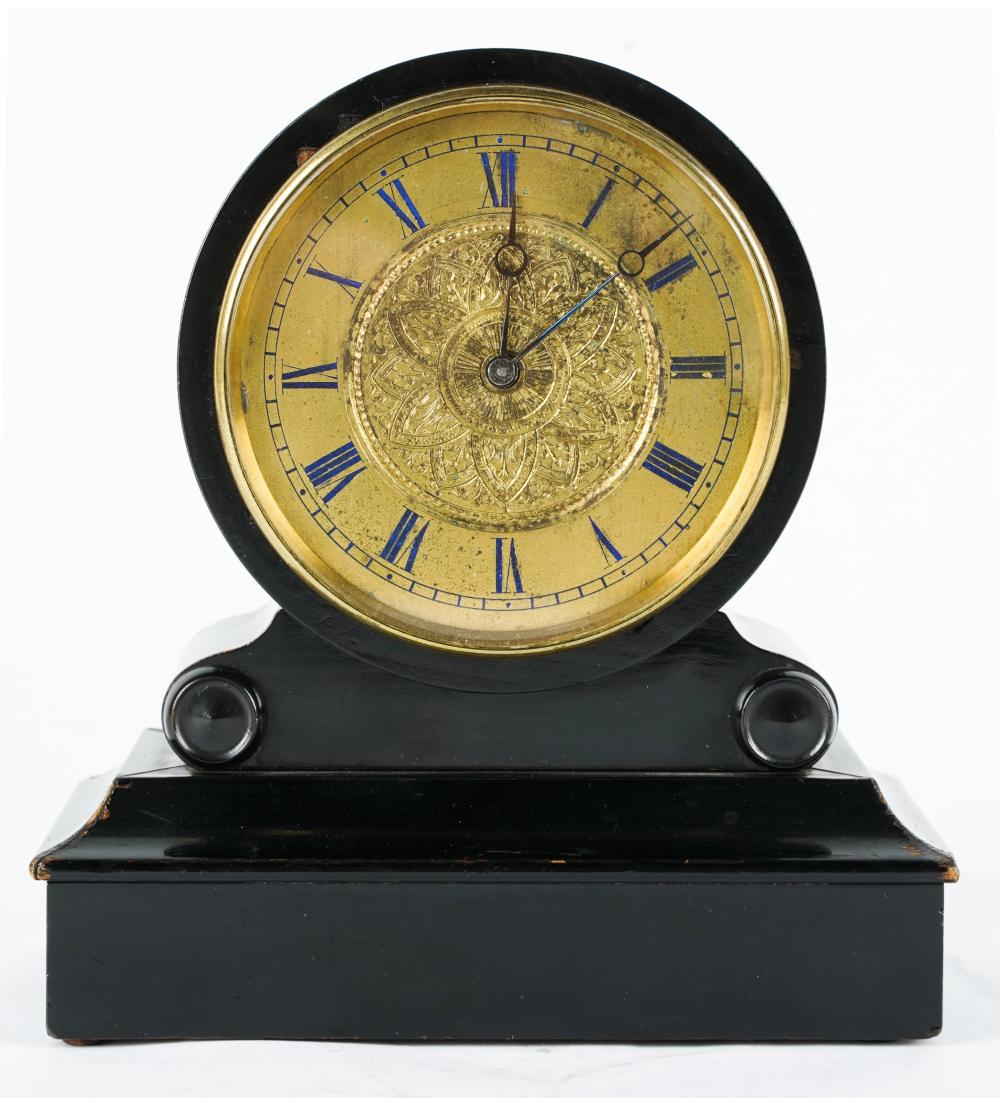 Appraisal: FRENCH EBONIZED WOOD MANTLE CLOCKthe gilt brass dial unsigned the