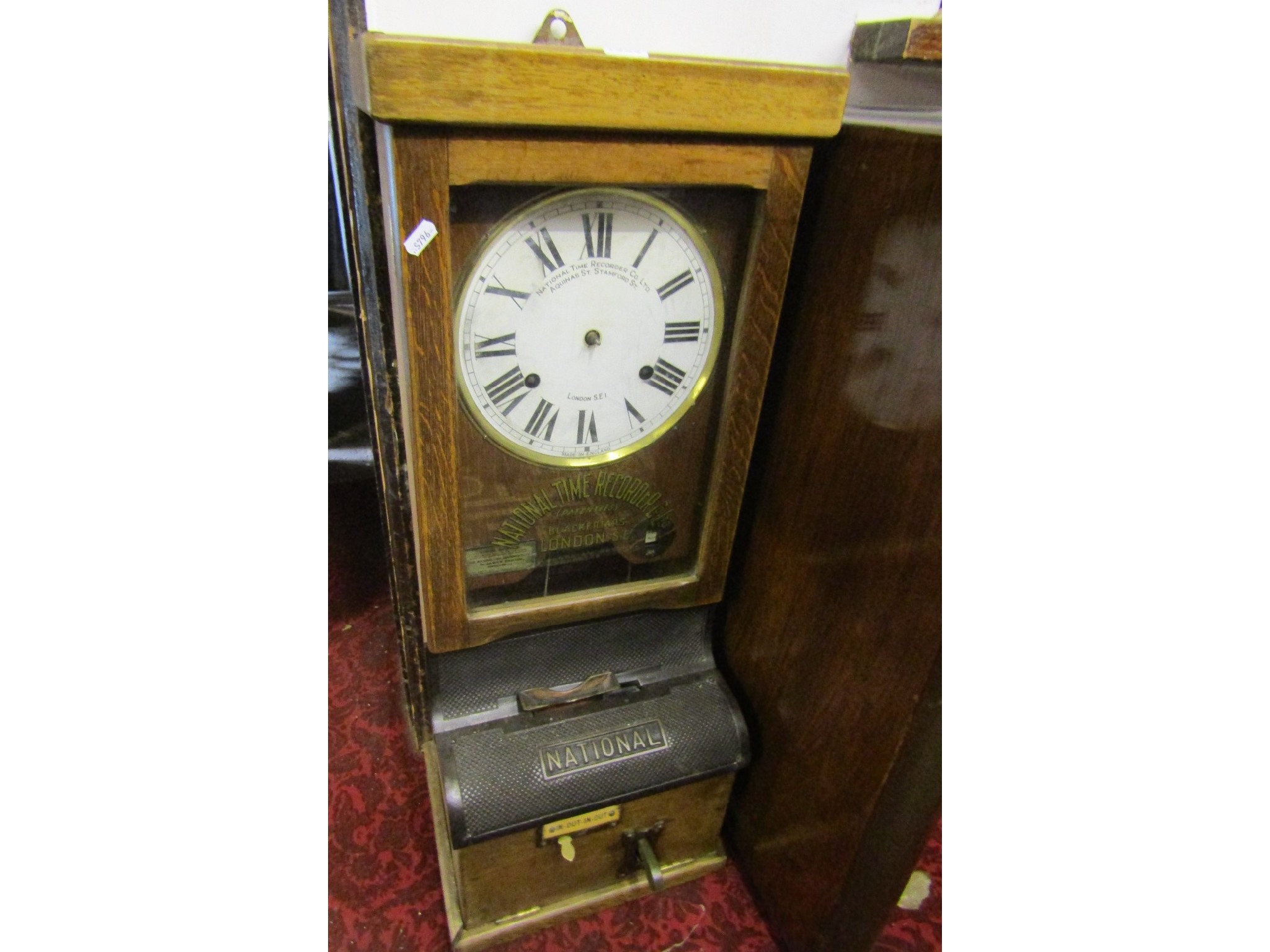 Appraisal: A National Time Recorder Co Ltd oak cased clocking in