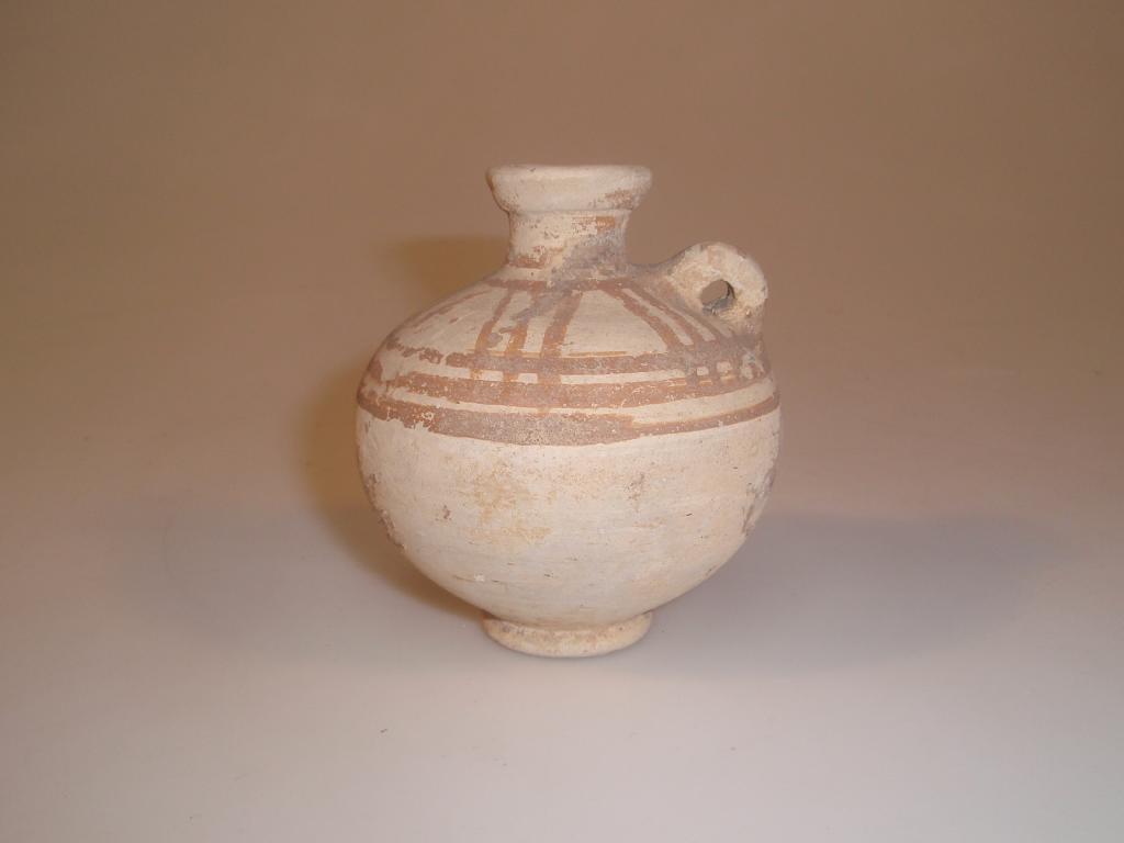 Appraisal: A Bronze Age Cypriote pottery vase the small flaring mouth