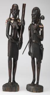 Appraisal: Pair of male and female carved ebony figures h Pair