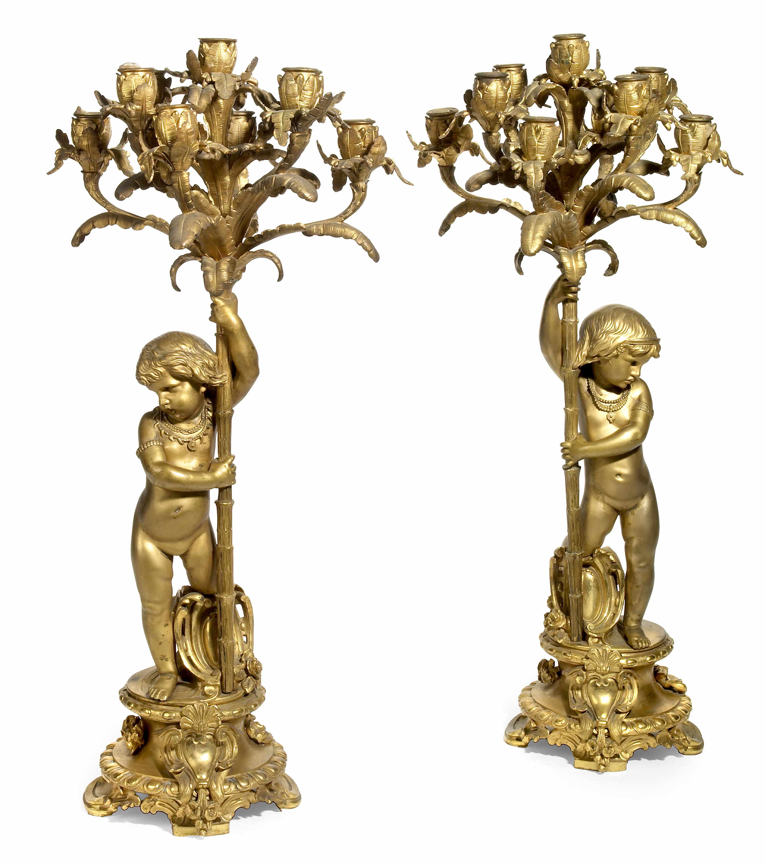 Appraisal: A pair of Napoleon III gilt bronze nine light candelabra