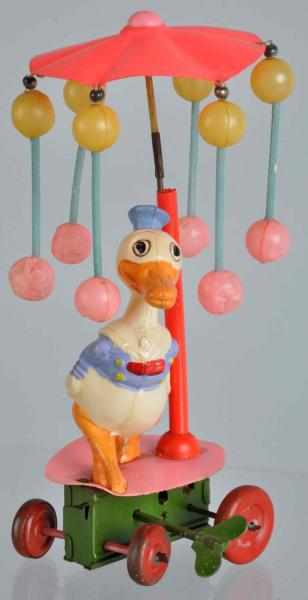 Appraisal: Celluloid Disney Donald Duck Whirligig Toy Description Japanese Pre-war Marked