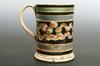 Appraisal: MUG - Earthworm pattern mocha mug high heavily stained and