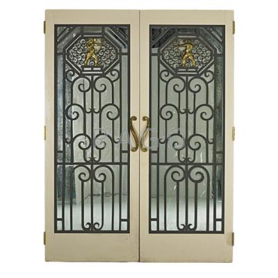 Appraisal: SET OF SMOKED GLASS MIRRORED DOORS Wrought iron grilles with