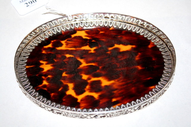 Appraisal: A SILVER AND TORTOISESHELL OVAL TRAY shell base with a