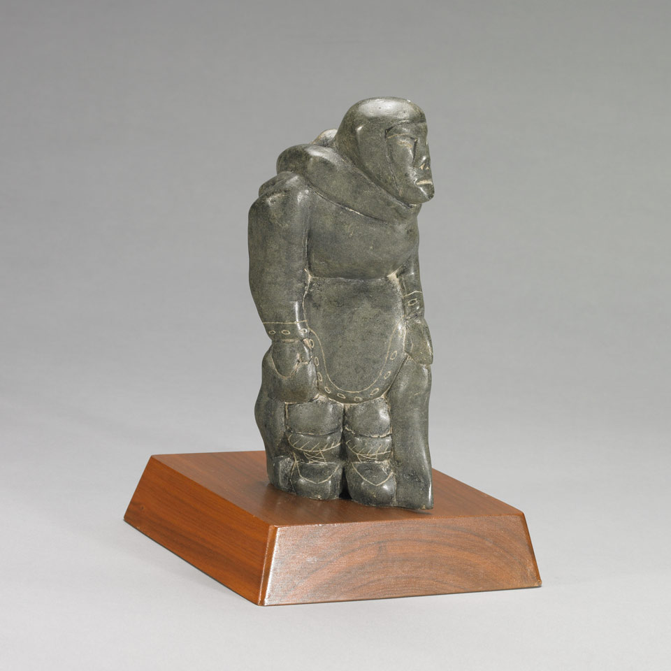 Appraisal: E KAYUK Sanikiluaq MOTHER AND CHILD stone wood On wooden