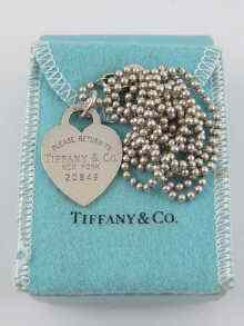 Appraisal: A Tiffany Co silver heart pendant necklace in original pouch