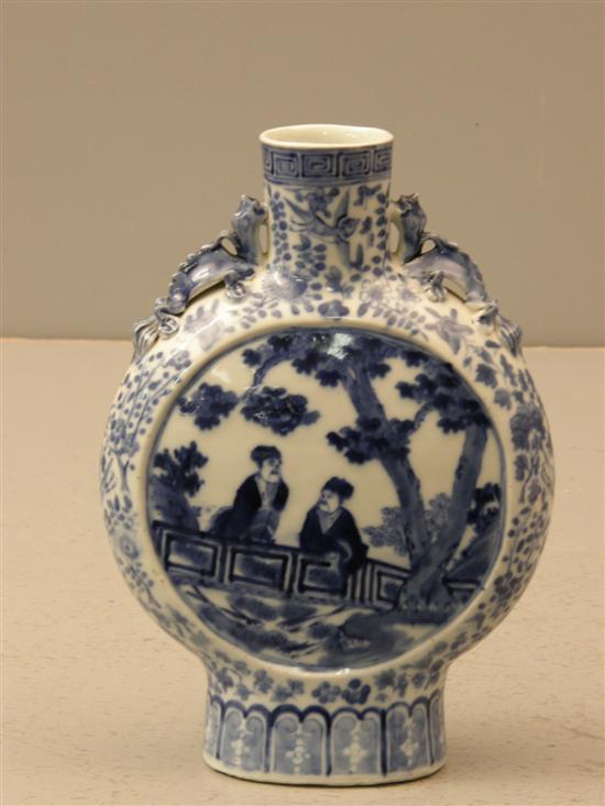 Appraisal: th century Chinese blue and white moon flask with applied