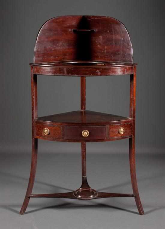 Appraisal: George III mahogany corner washstand circa with single drawer and