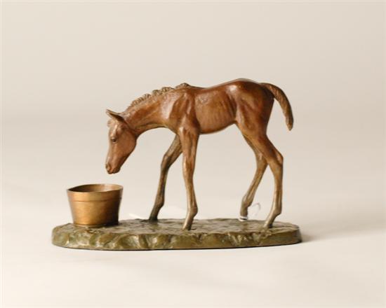 Appraisal: Bronze Foal bending over bucket high long