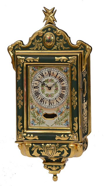 Appraisal: A MALTESE WALL CLOCK with floral painted Roman dial Arabic