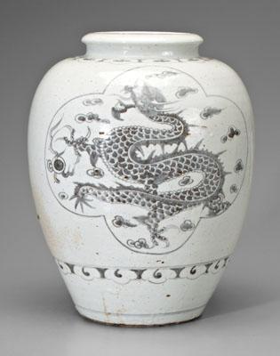 Appraisal: Chinese white-glazed jar quatrefoil cartouches with dragon and pearl in