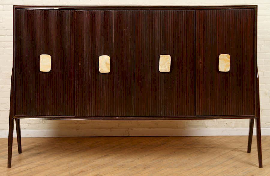 Appraisal: MAHOGANY BAR CABINET WITH MARBLE PULLS BY BORSANI A mahogany