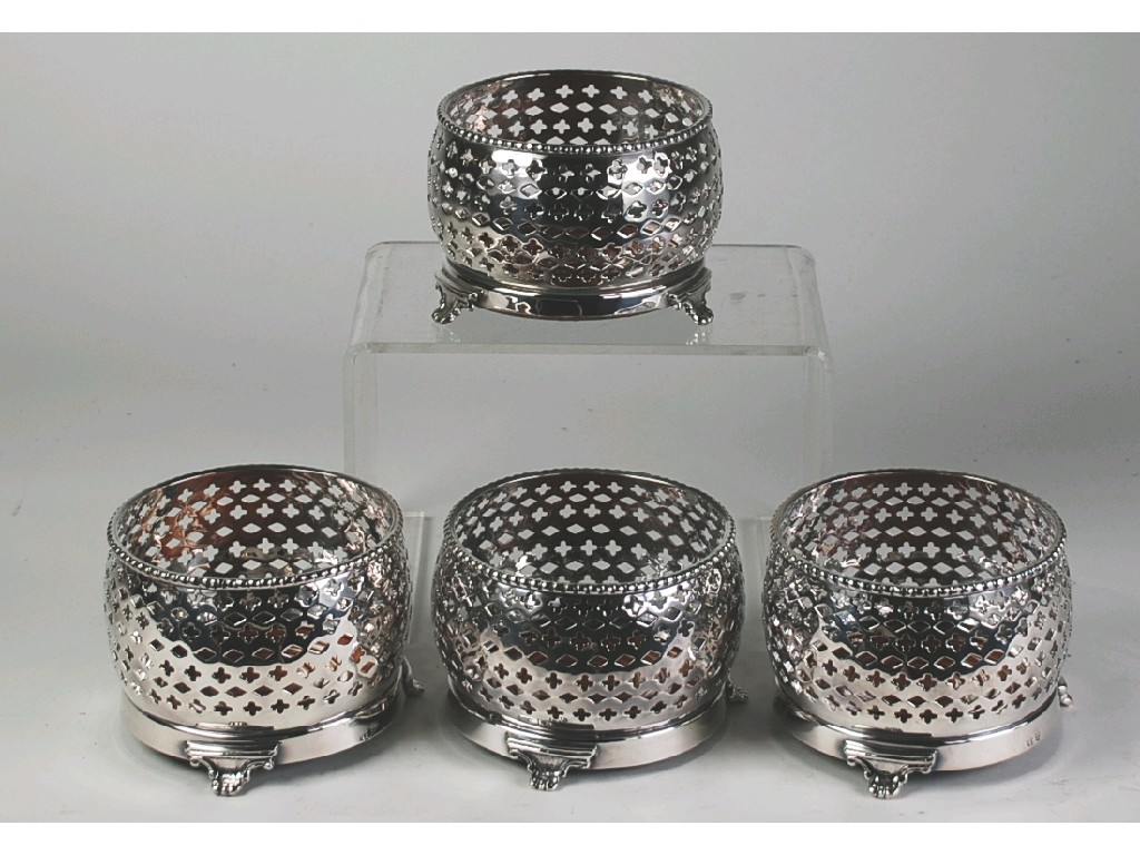 Appraisal: SET FOUR ELECTROPLATED DECANTER OR WINE COASTERS with beaded borders