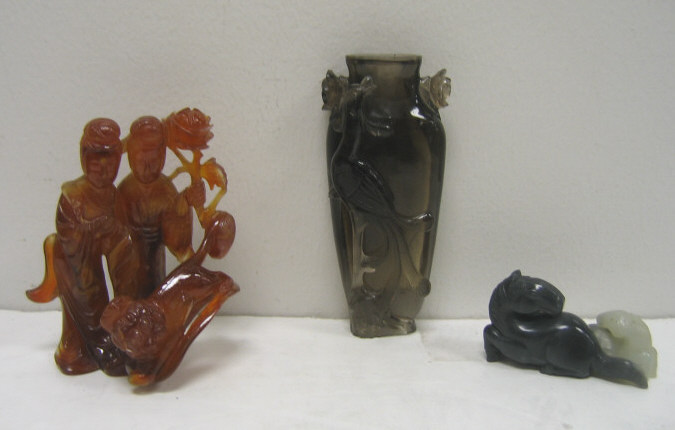 Appraisal: THREE ASIAN MINERAL CARVINGS Carnelian group of two beauties with