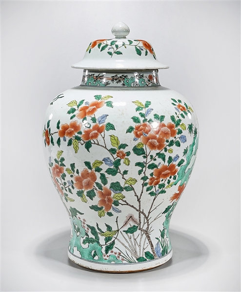 Appraisal: Chinese enameled porcelain covered vase with flowers and birds decoration