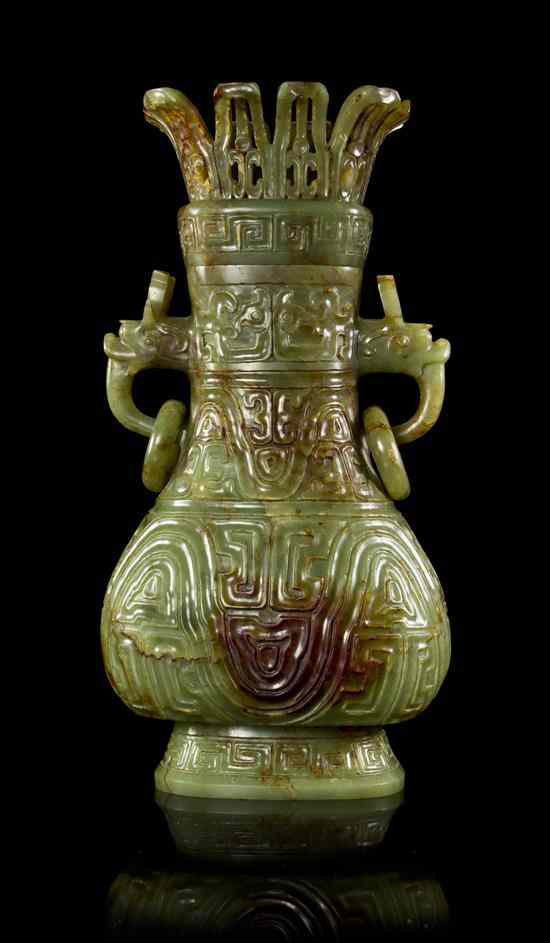 Appraisal: A Chinese Lidded Jade Vessel the olive green stone having