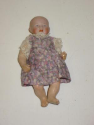 Appraisal: An Alt Beck Gottschalck miniature bisque head baby doll with