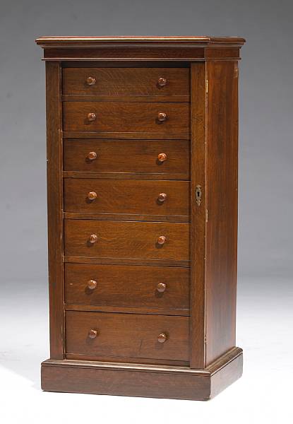 Appraisal: A Victorian mahogany Wellington cabinet late th century height in