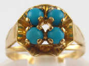 Appraisal: A yellow metal tests gold turquoise ring marked approx carat