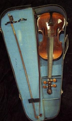 Appraisal: A single back violin the neck with mask carved scroll