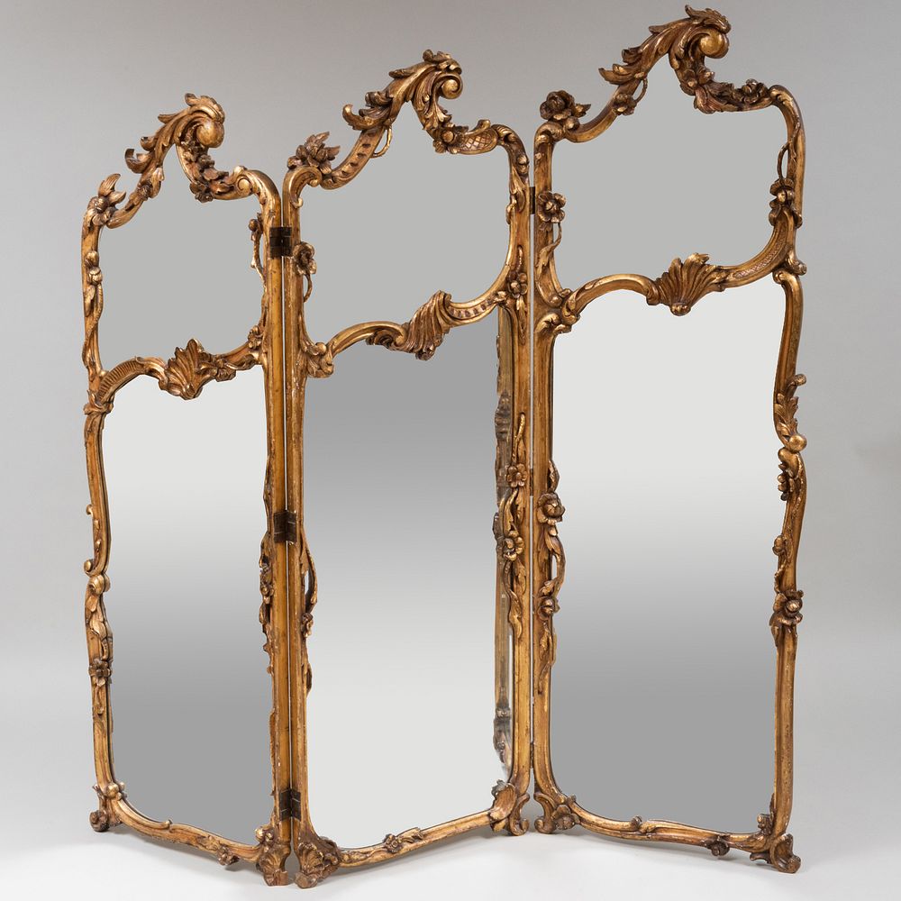 Appraisal: French Giltwood and Mirrored Three Panel Screen Fitted with silk