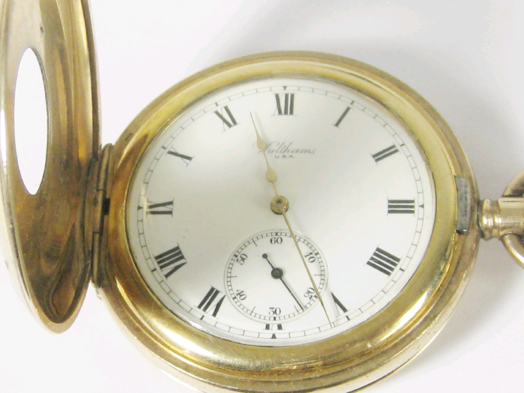 Appraisal: A Waltham Half-Hunter Pocket Watch the white enamel dial with